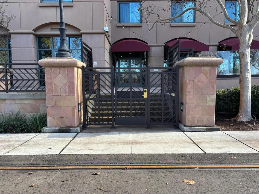 Custom ornamental iron gate and fence at a Sacramento hotel on Capitol Mall by Palmer Fence