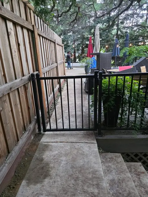 Black ornamental iron railing and gate by Palmer Fence in Folsom