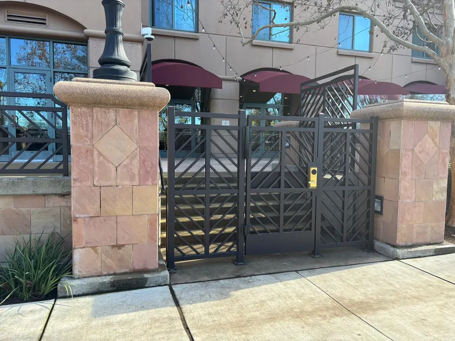 ADA-compliant ornamental iron entrance gate at the Sacramento hotel