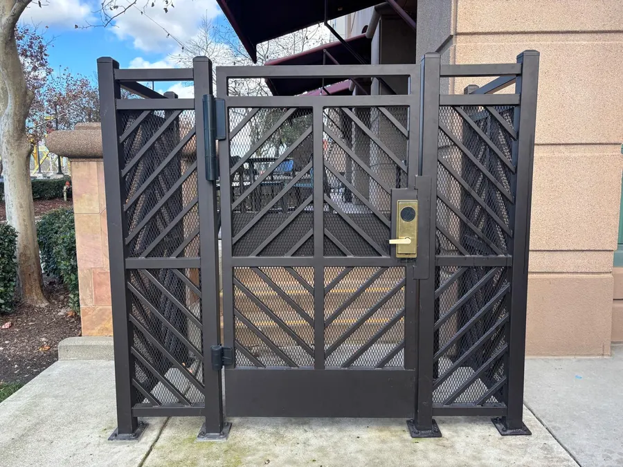 Close-up of ornamental iron gate hardware and bronze powder coat, Sacramento hotel