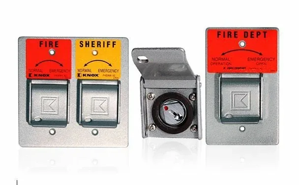 Knox emergency key switches labeled Fire, Sheriff and Fire Dept for commercial gate access